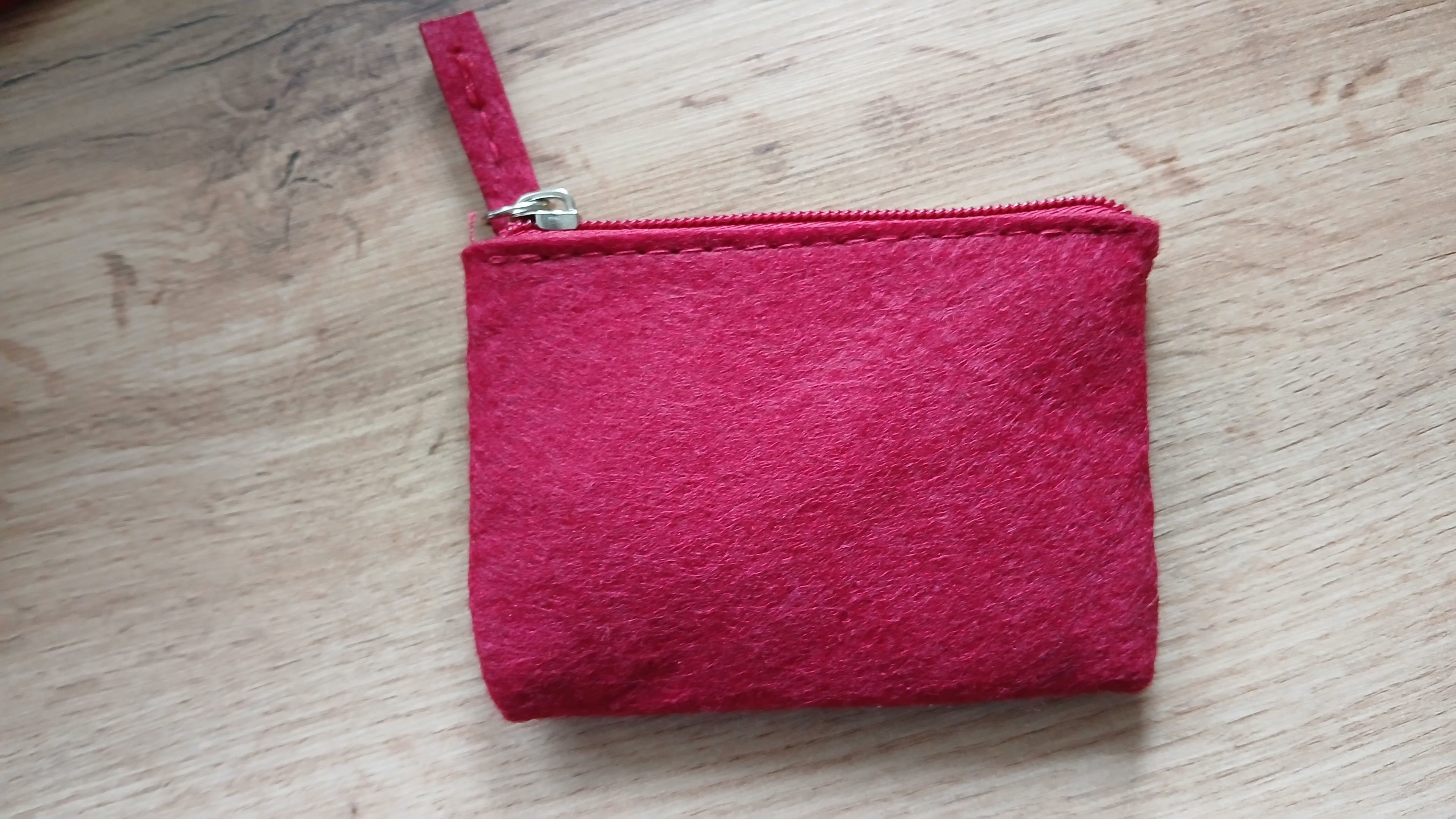 Back of red felt wallet