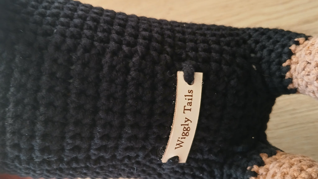 Close up on a "Wiggly Tails" label