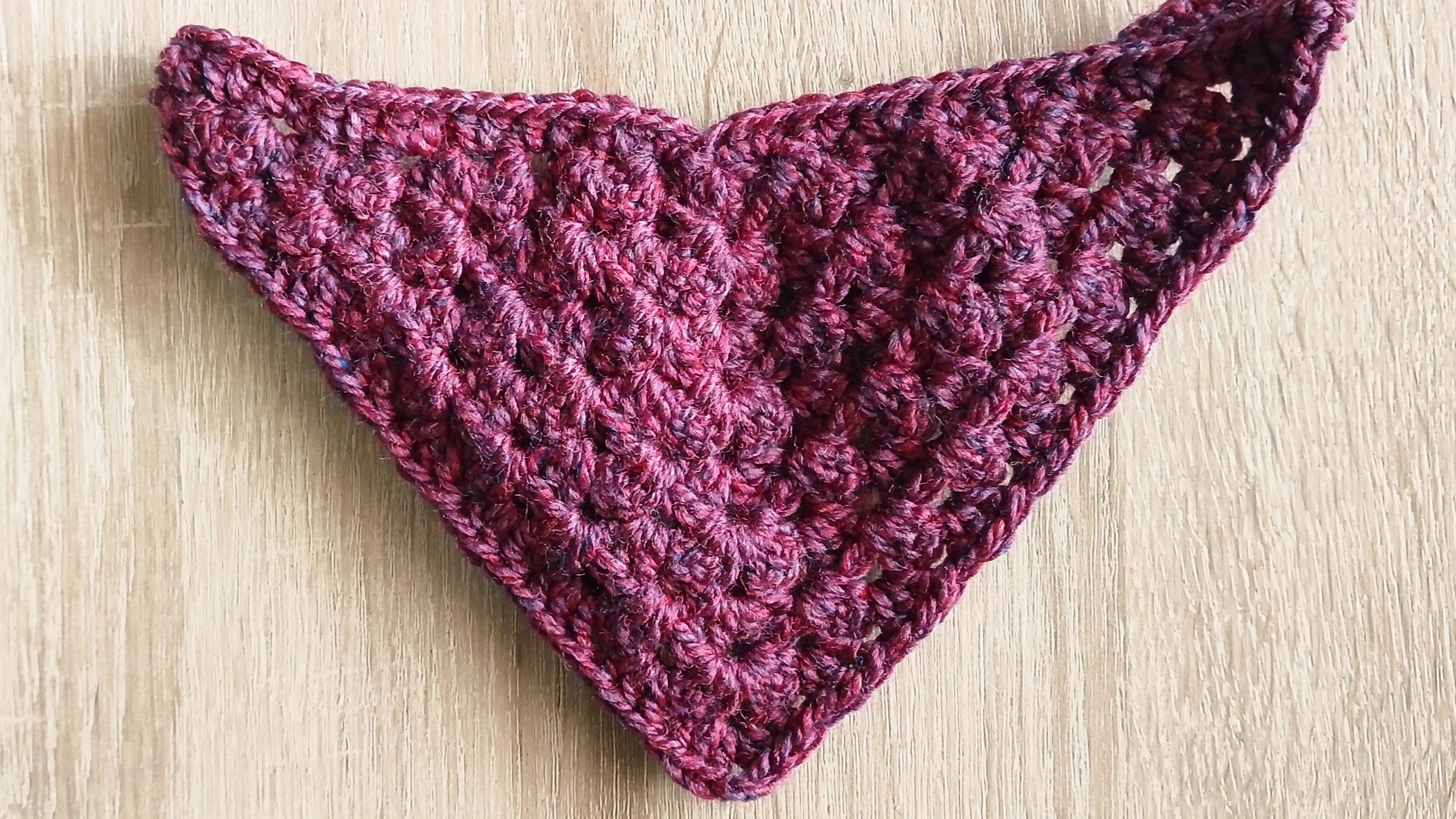 Burgundy dog bandana in size small to medium