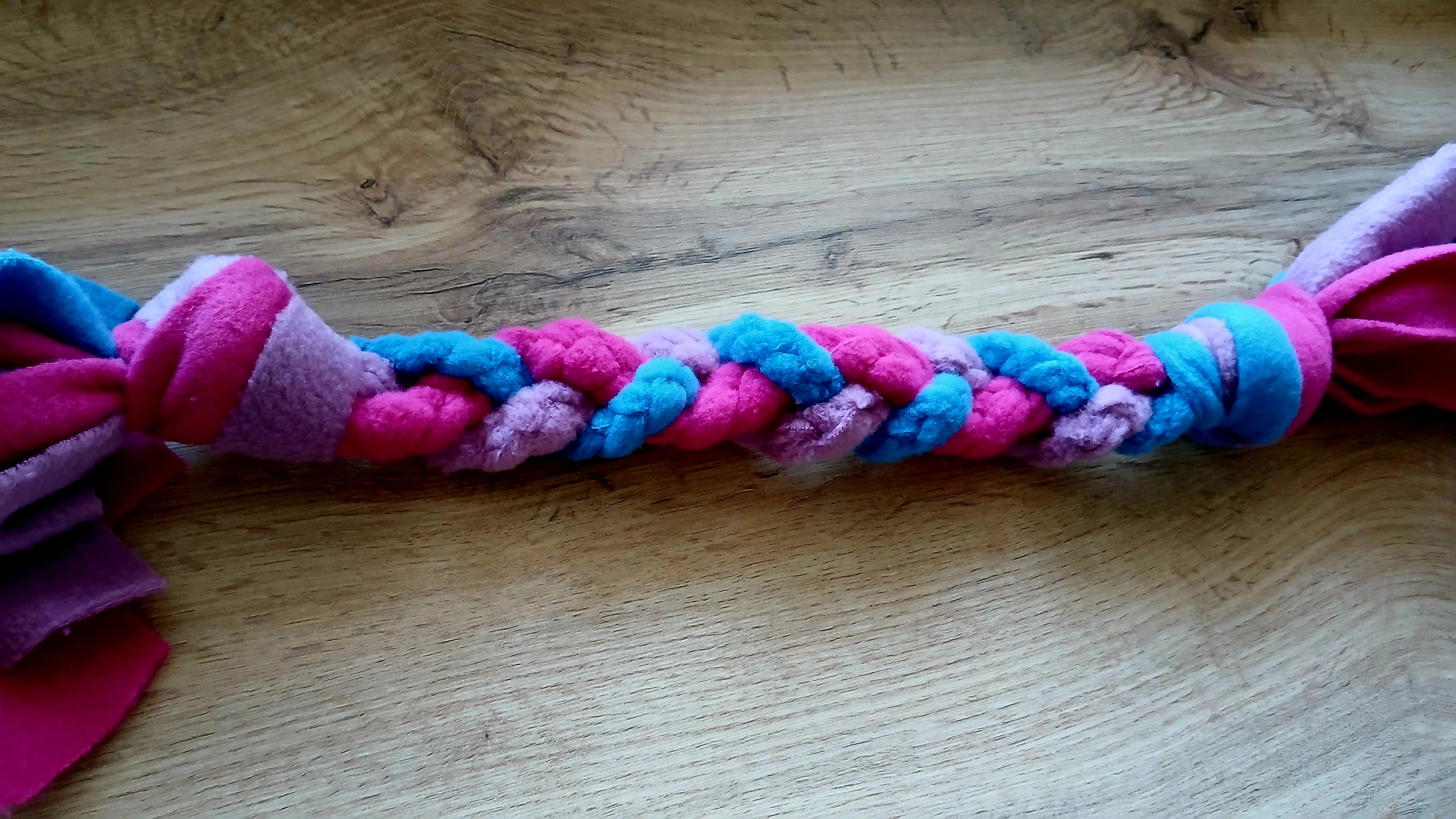 Fleece Tug Toy in purple and pink