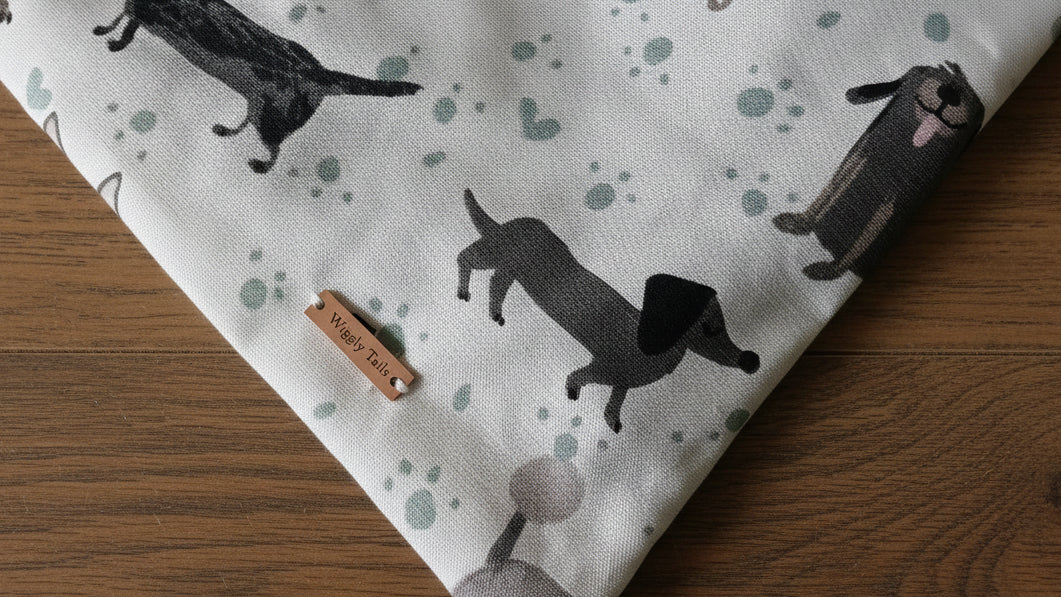 A close up on outer fabric with Wiggly Tails logo
