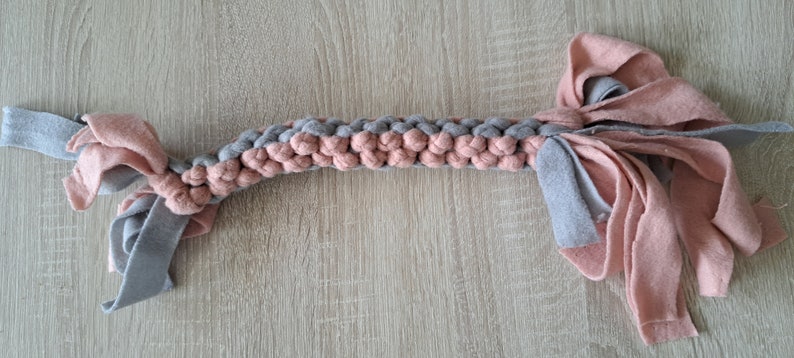 Hand braided pull dog toy in baby pink and gray