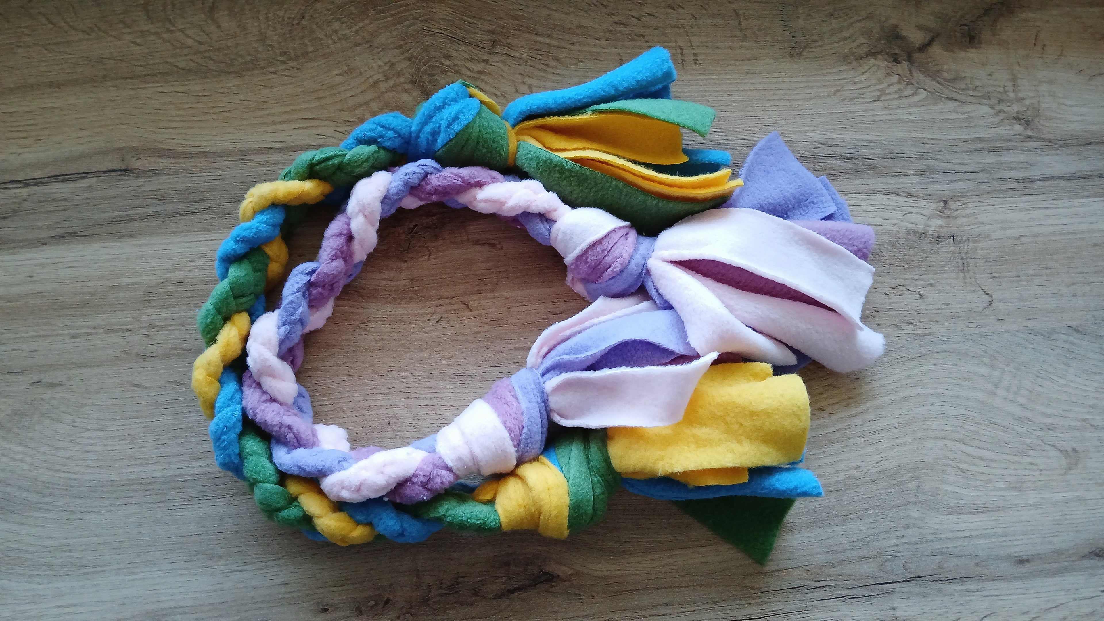 Picture of two colorful fleece tug toys