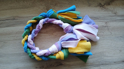 Picture of two colorful fleece tug toys