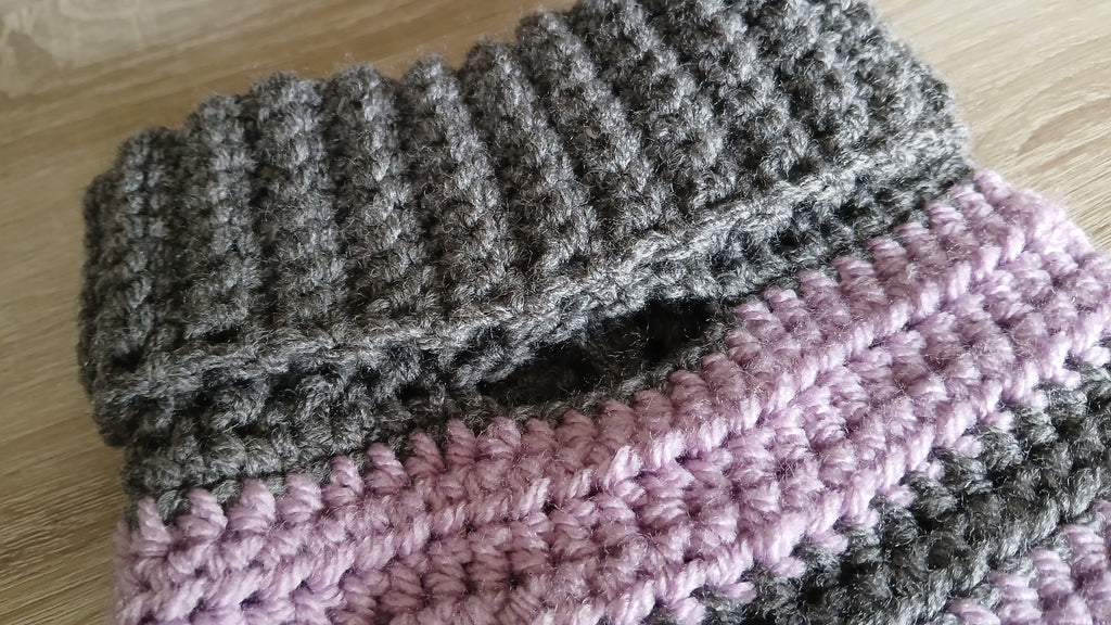 A close up on the opening for a leash 