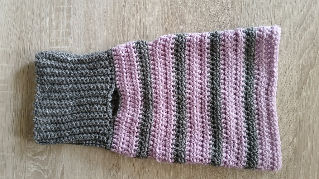 A flatlay of striped grey lilac dog turtleneck 