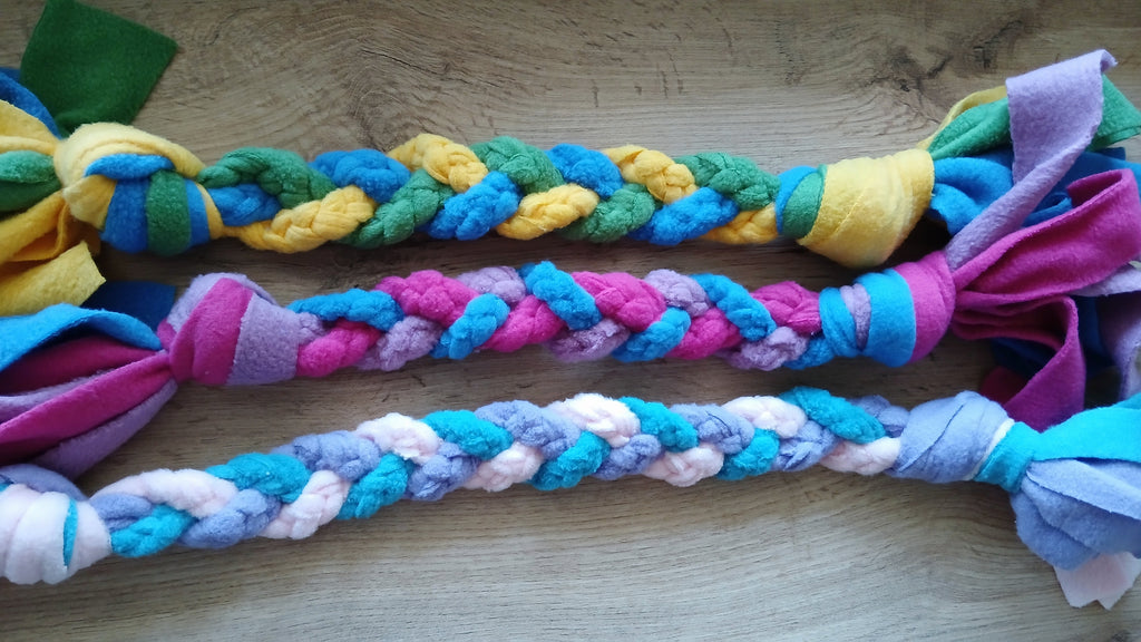 3 hand braided dog toys