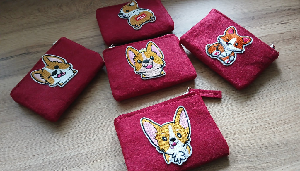 Collection of red felt coin pouches