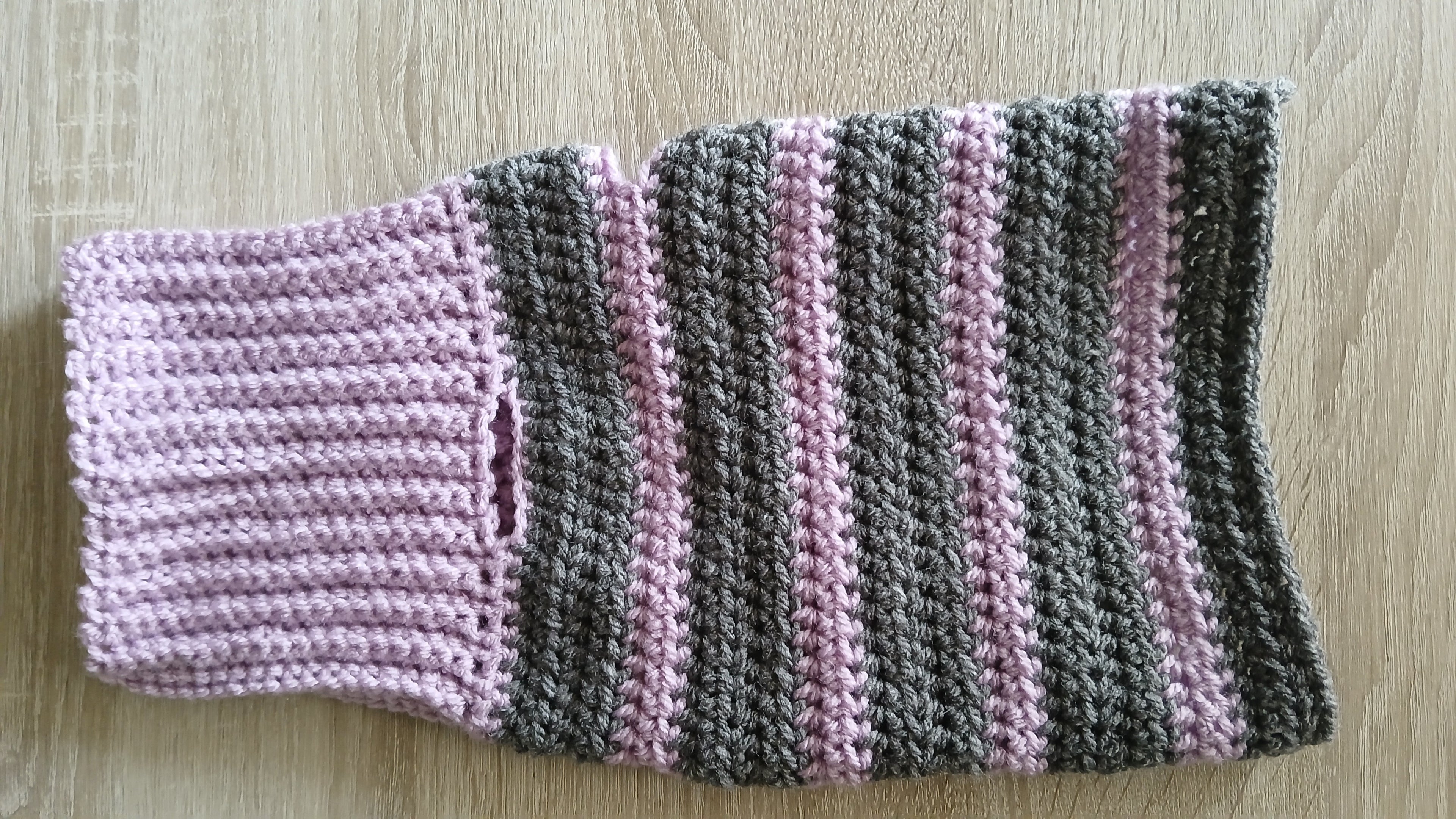 A flatlay of lilac grey sweater 