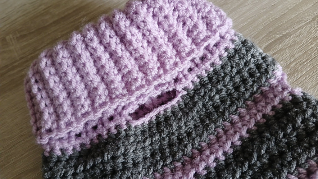 A close up of opening for a leash 