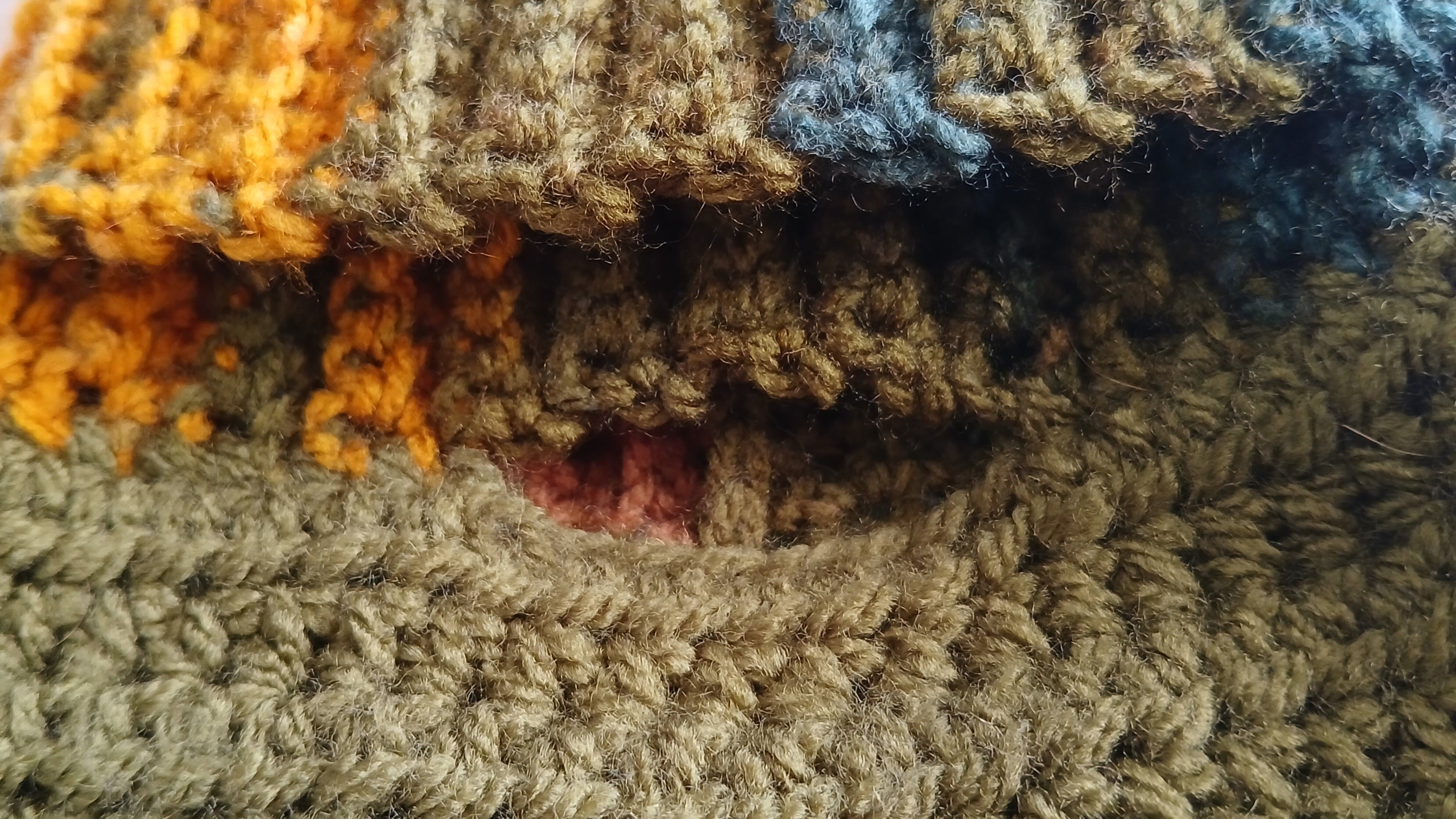 A close up of an opening for a dog leash