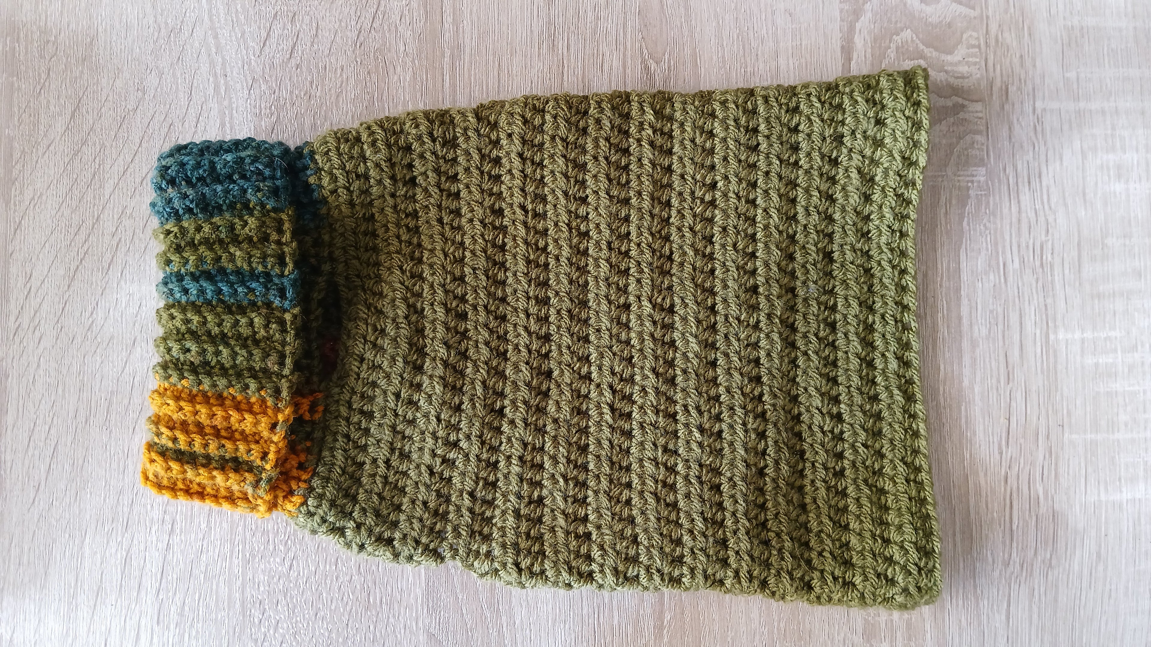 A dog sweater with rolled up turtleneck 