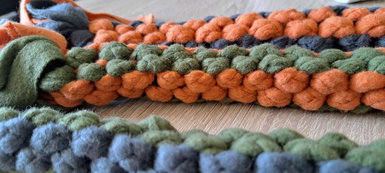 Close up on hand braided fleece dog toys 