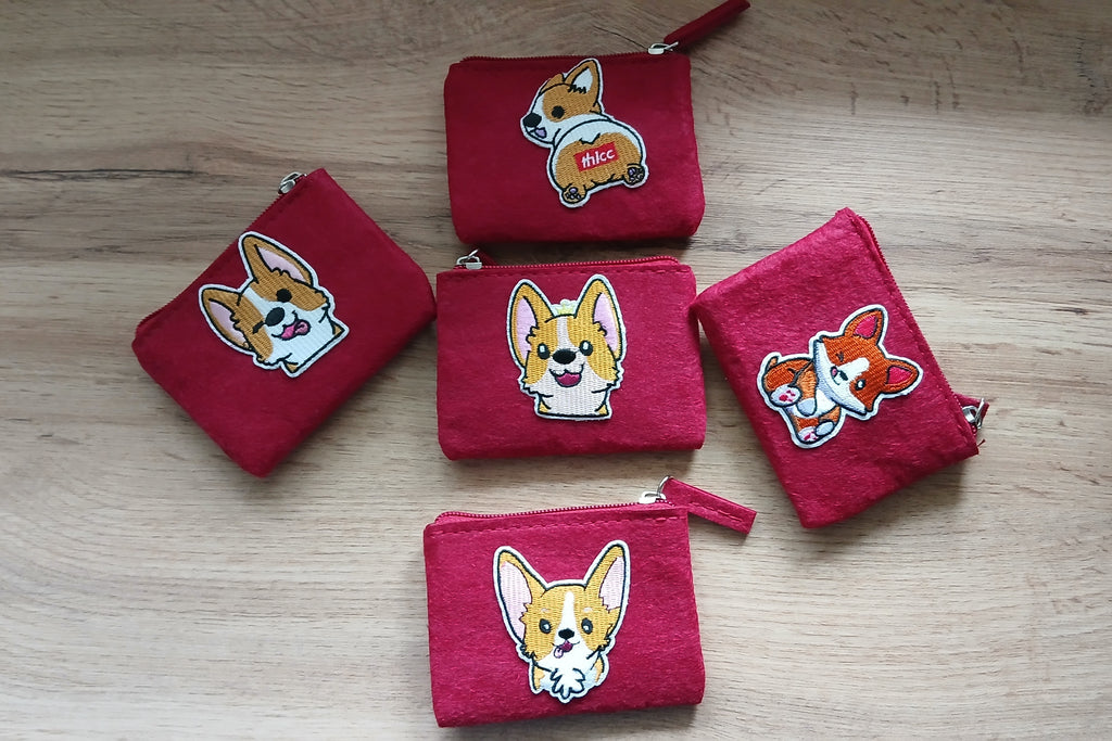 Collection of red felt wallets
