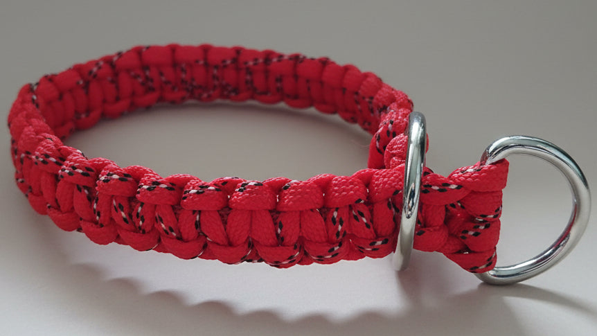Red paracord dog collar with a metal ring