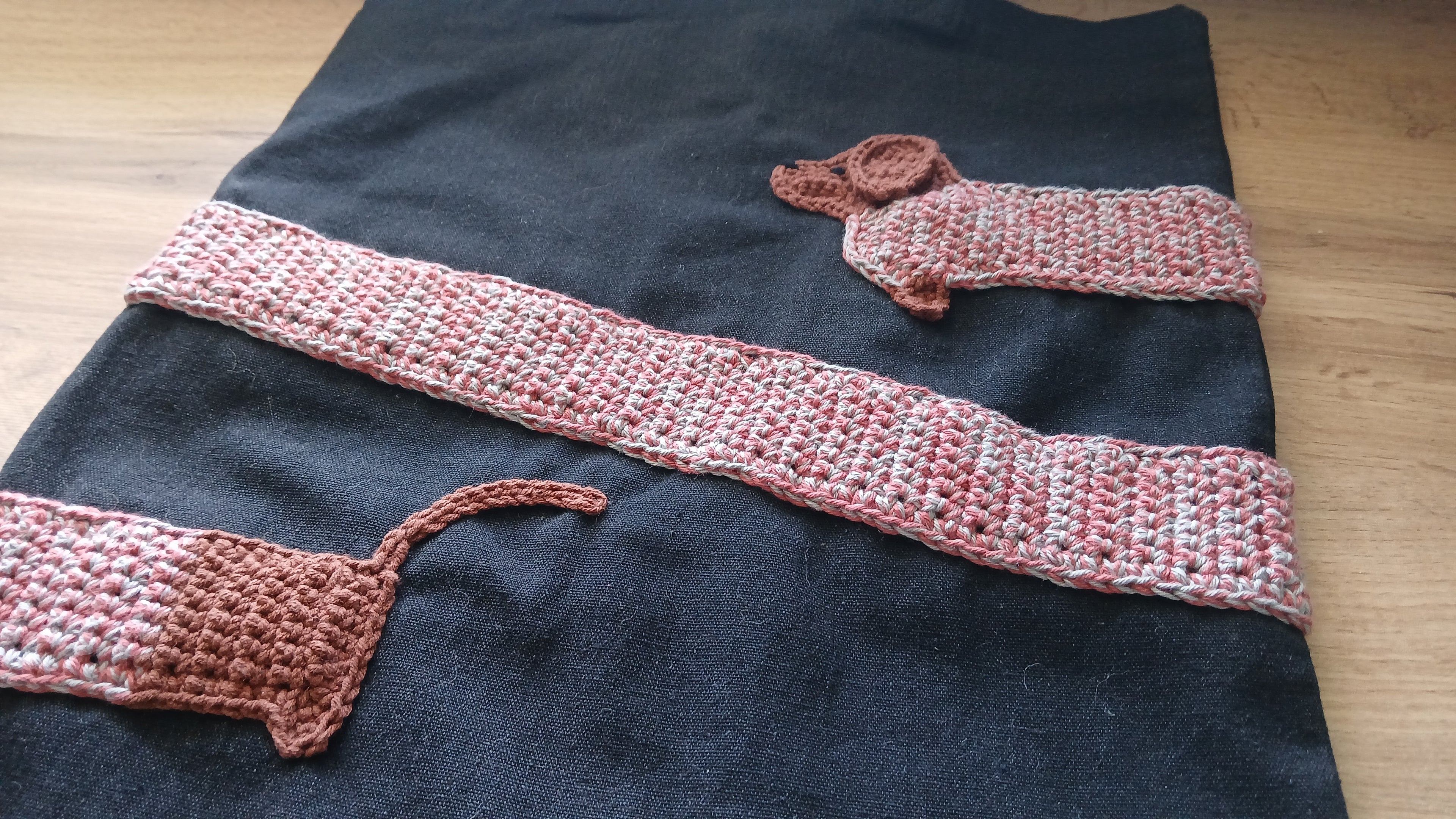 A flatlay of sausage dog tote bag