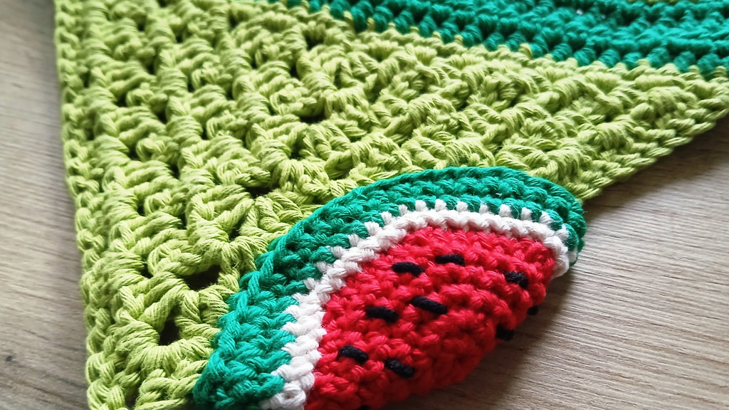 Crochet green dog bandana with a watermelon slice design