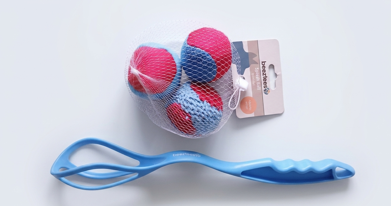 three blue and red splash ball in a mesh net with a blue launcher handle