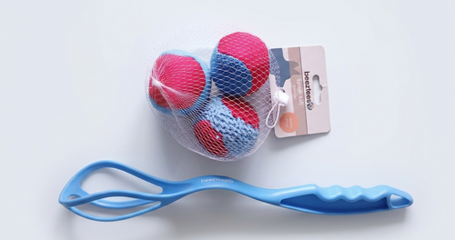 three blue and red splash ball in a mesh net with a blue launcher handle