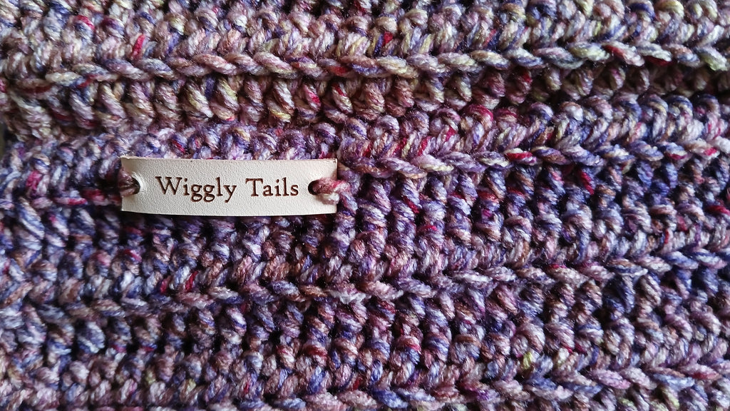 Close up on a colorway and stitching of a handmade dog snood